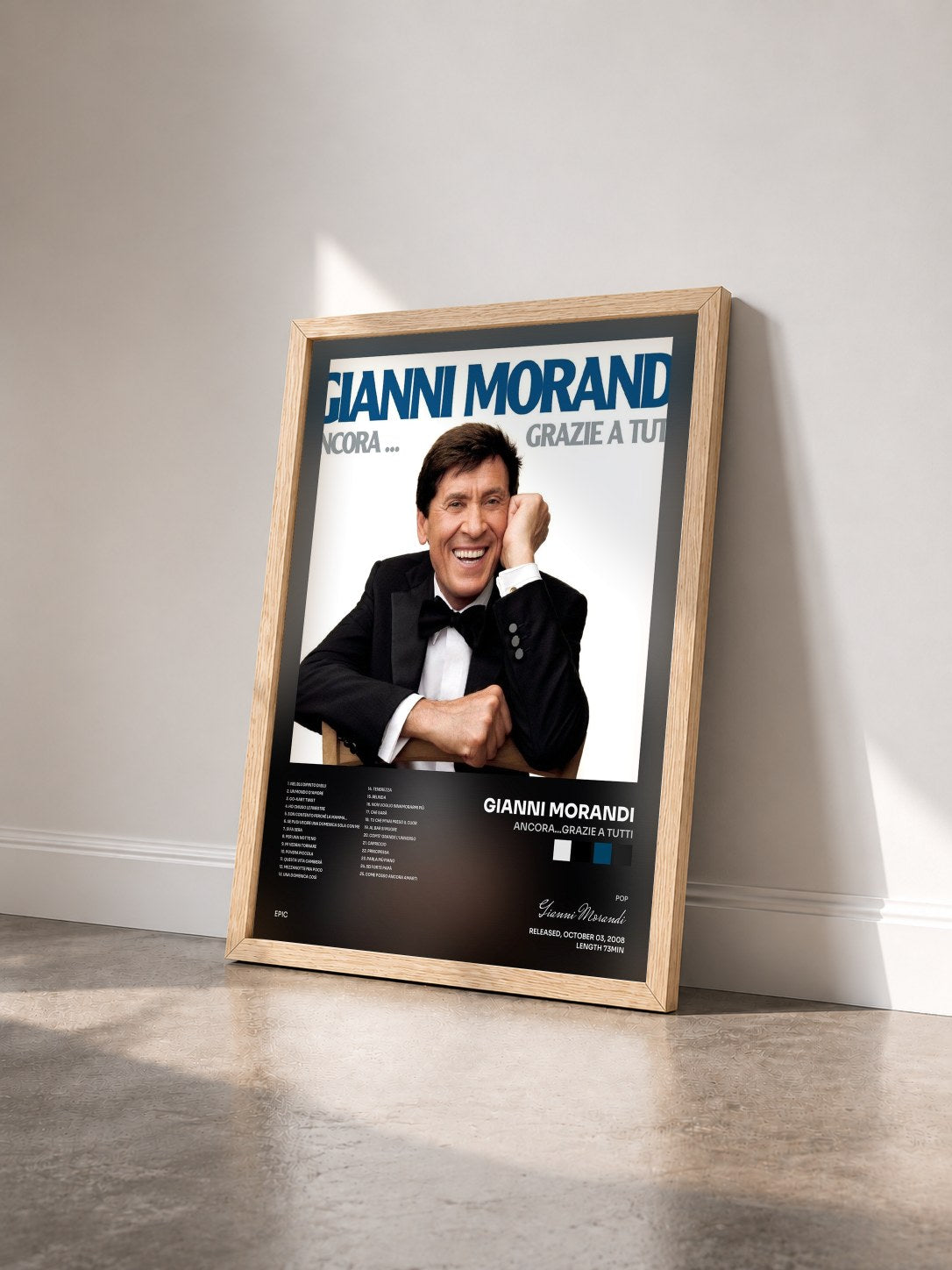 #bois Tableau de l'album Ancora...Grazie A Tutti de Gianni Morandi vu de trois quarts, cadre en bois brut