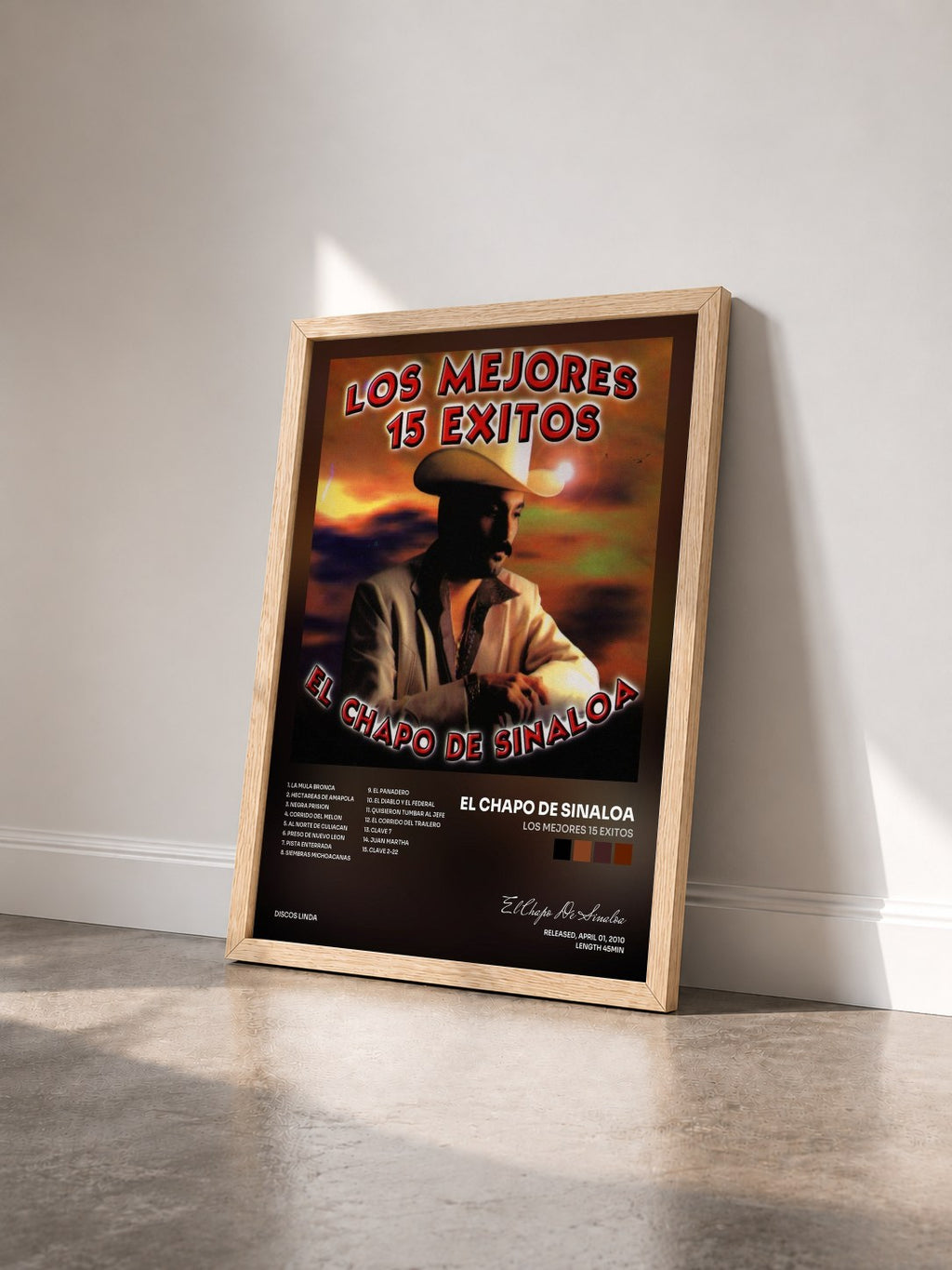 #bois Tableau de l'album Los Mejores 15 Exitos de El Chapo De Sinaloa vu de trois quarts, cadre en bois brut
