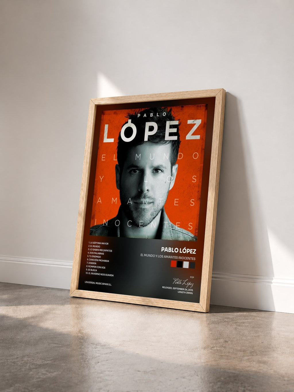 #bois Tableau de l'album El Mundo Y Los Amantes Inocentes de Pablo López vu de trois quarts, cadre en bois brut