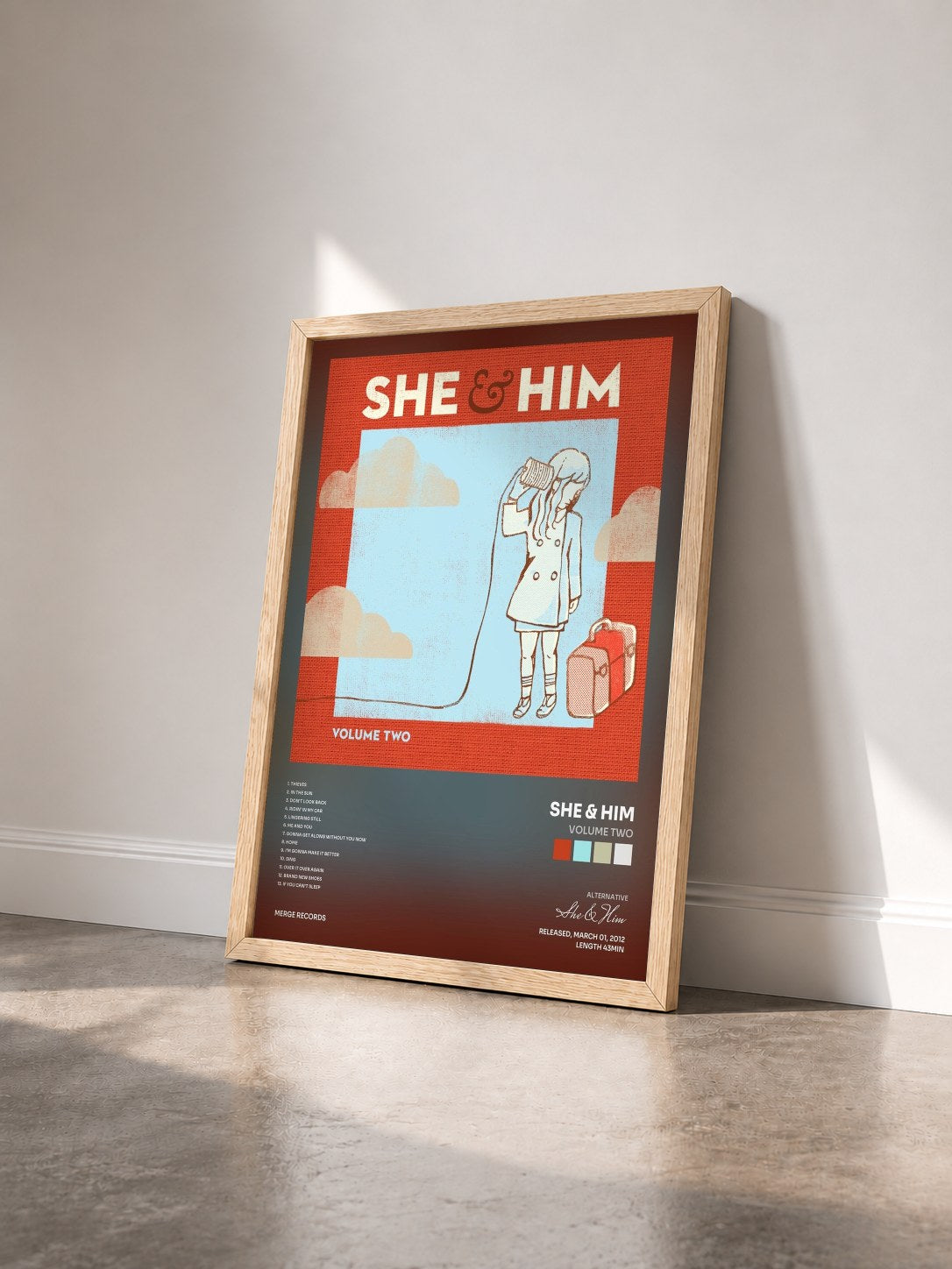 #bois Tableau de l'album Volume Two de She & Him vu de trois quarts, cadre en bois brut