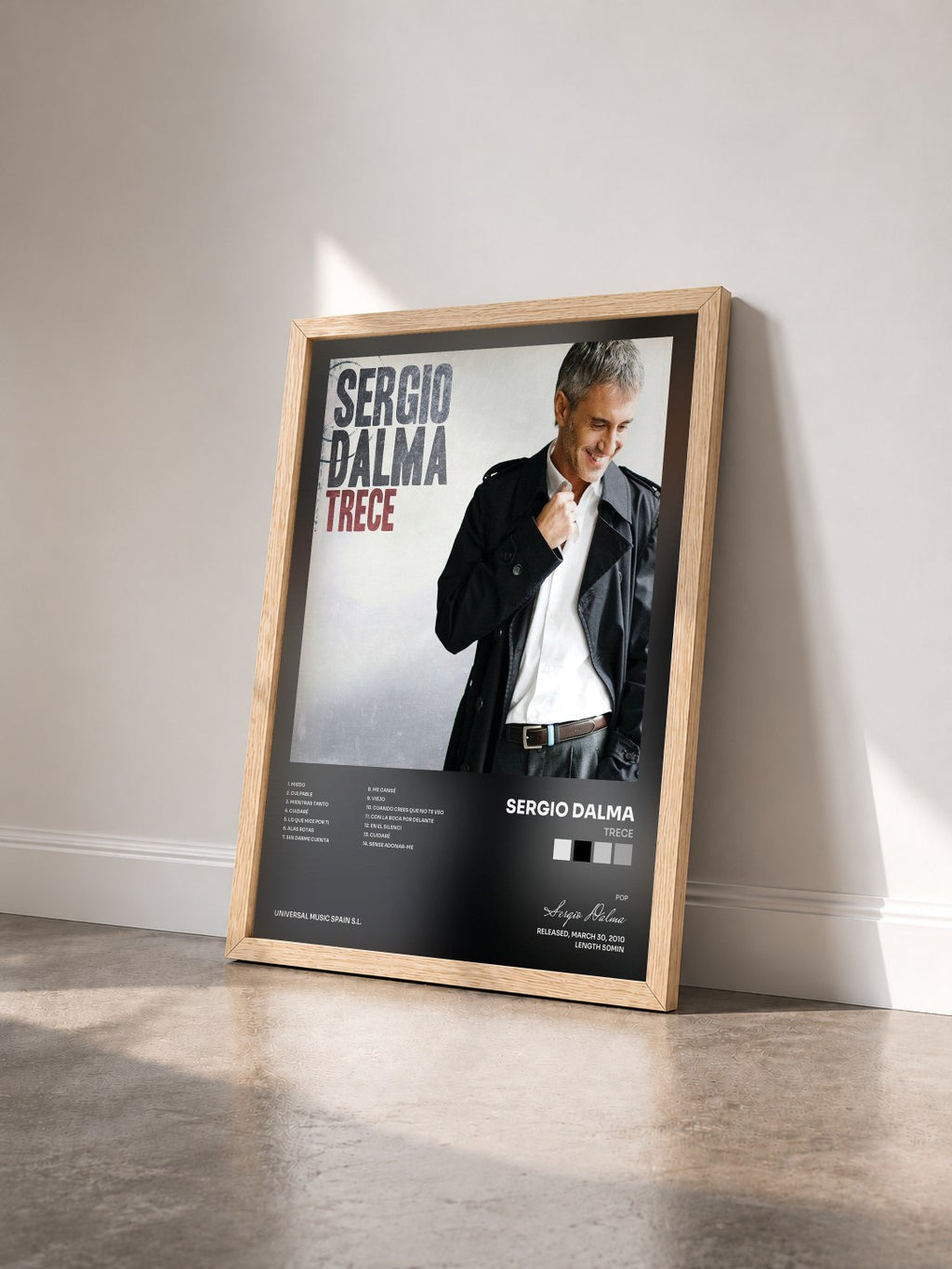 #bois Tableau de l'album Trece de Sergio Dalma vu de trois quarts, cadre en bois brut