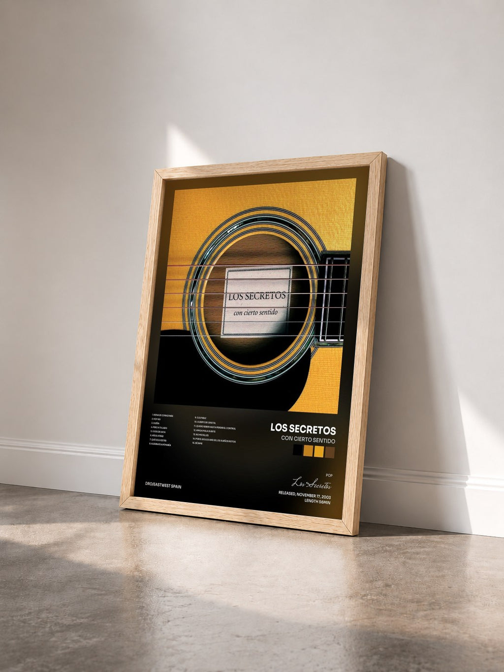 #bois Tableau de l'album Con Cierto Sentido de Los Secretos vu de trois quarts, cadre en bois brut