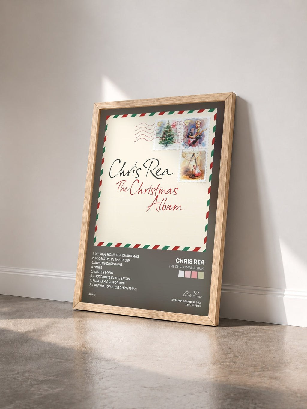 #bois Tableau de l'album The Christmas Album de Chris Rea vu de trois quarts, cadre en bois brut