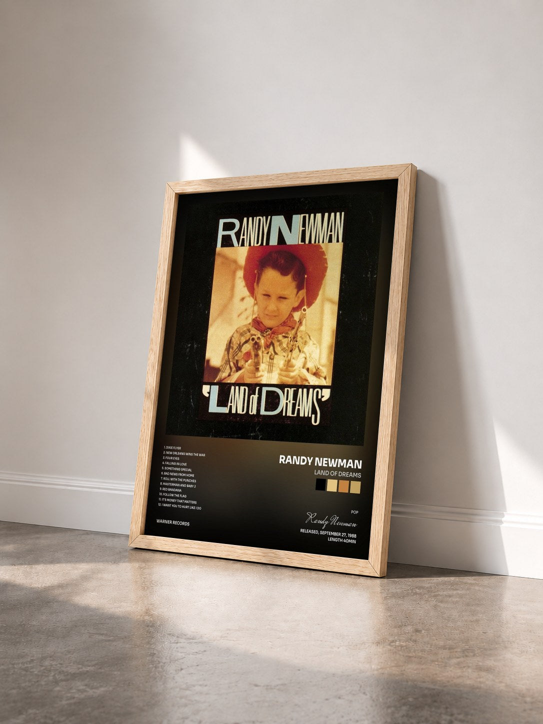 #bois Tableau de l'album Land of Dreams de Randy Newman vu de trois quarts, cadre en bois brut