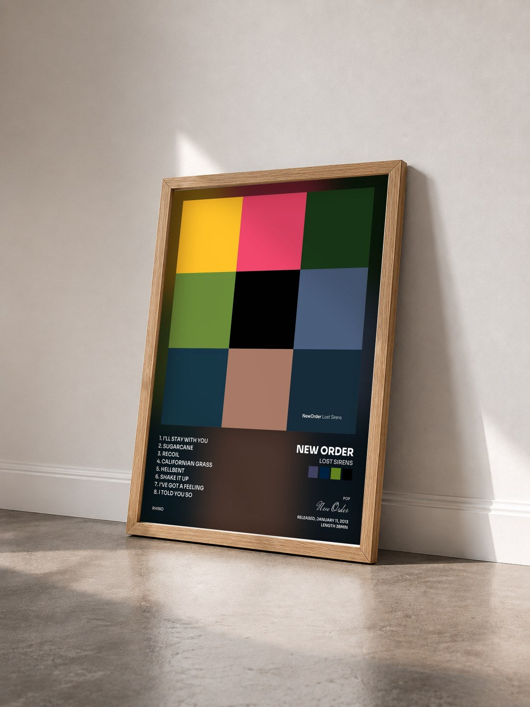 #bois Tableau de l'album Lost Sirens de New Order vu de trois quarts, cadre en bois brut