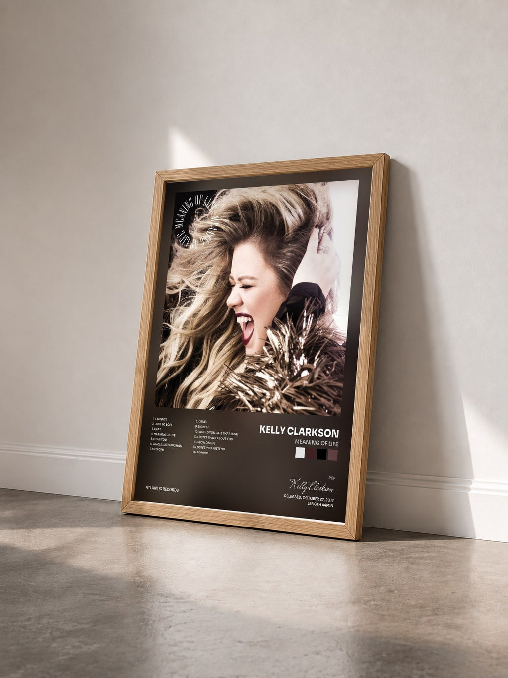 #bois Tableau de l'album Meaning of Life de Kelly Clarkson vu de trois quarts, cadre en bois brut