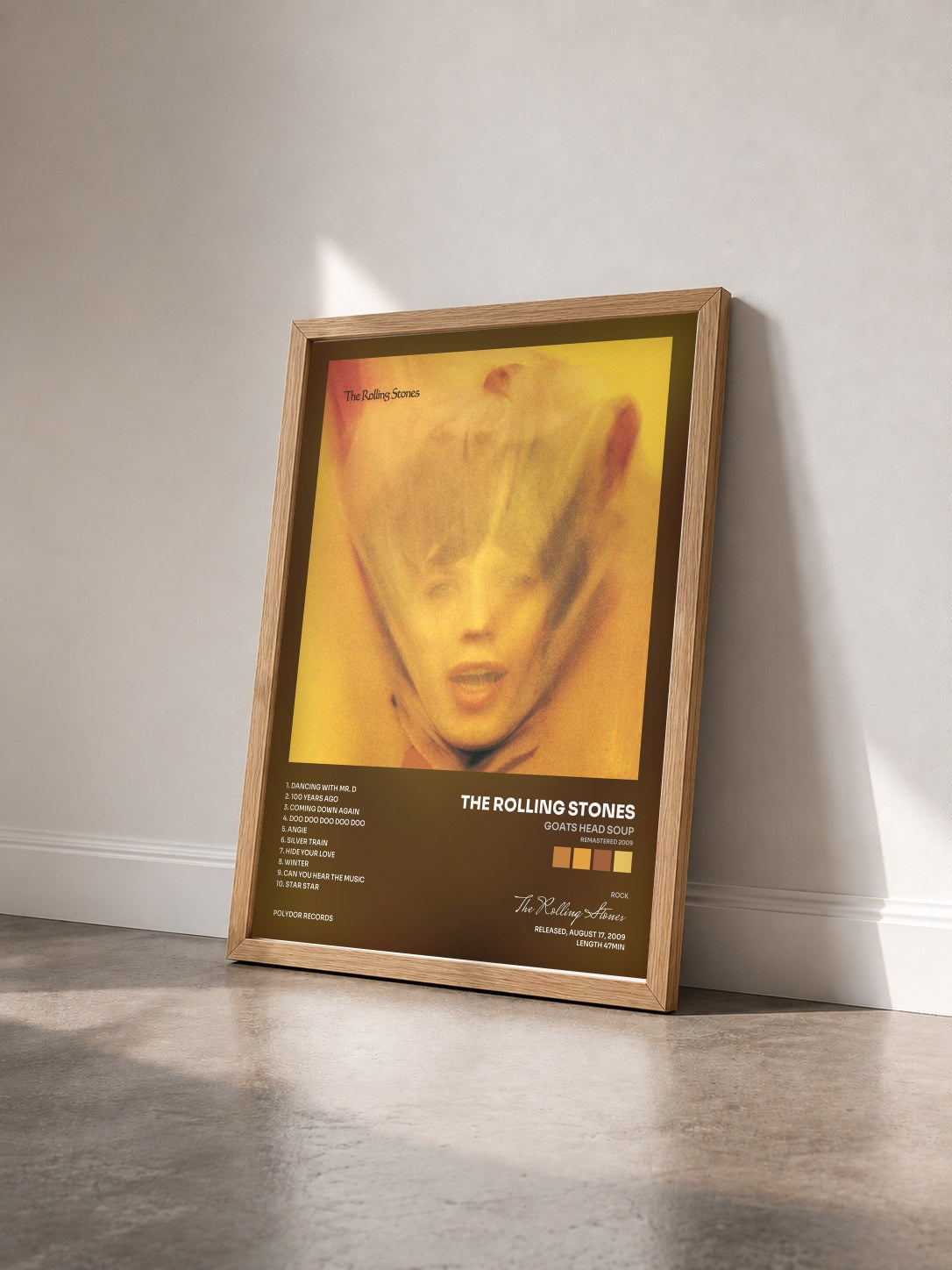 #bois Tableau de l'album Goats Head Soup (Remastered 2009) de The Rolling Stones vu de trois quarts, cadre en bois brut