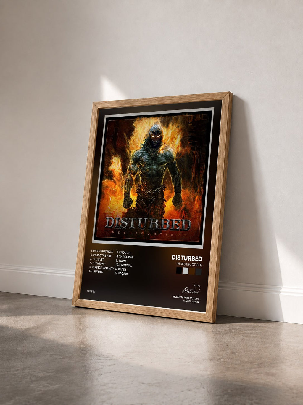 #bois Tableau de l'album Indestructible de Disturbed vu de trois quarts, cadre en bois brut