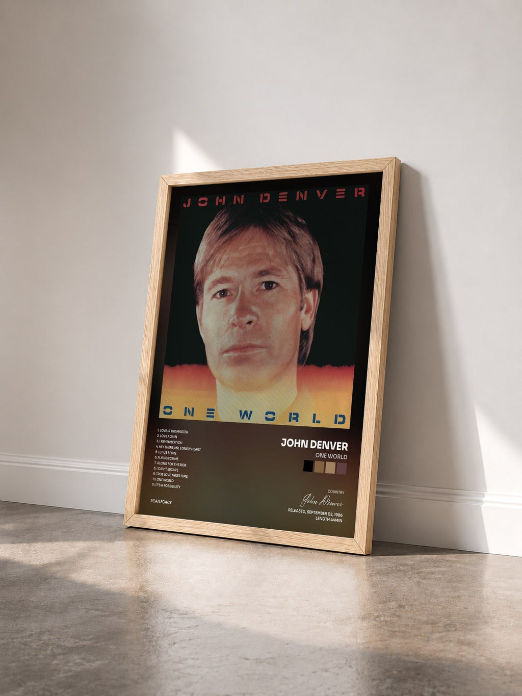 #bois Tableau de l'album One World de John Denver vu de trois quarts, cadre en bois brut