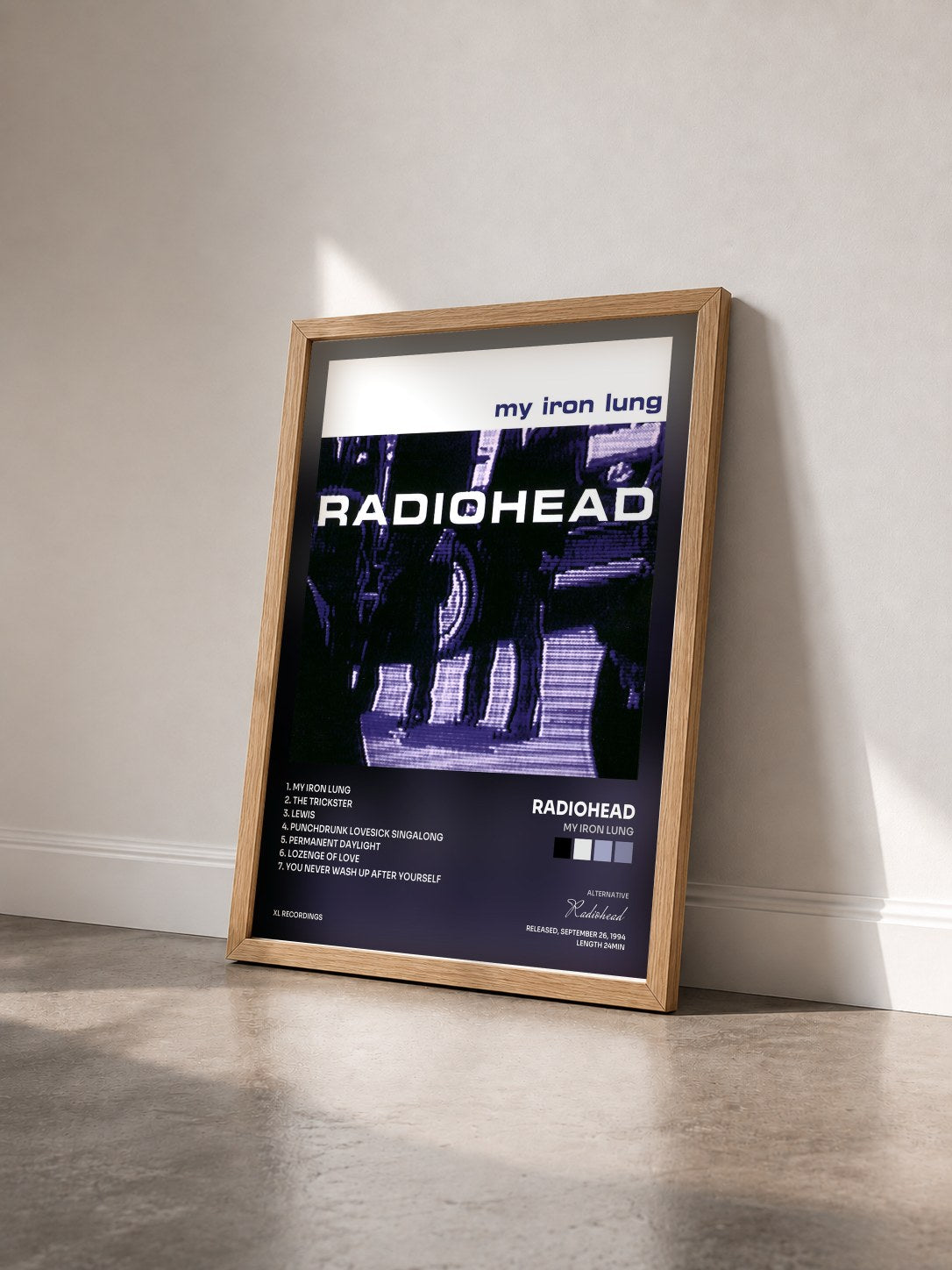 #bois Tableau de l'album My Iron Lung de Radiohead vu de trois quarts, cadre en bois brut