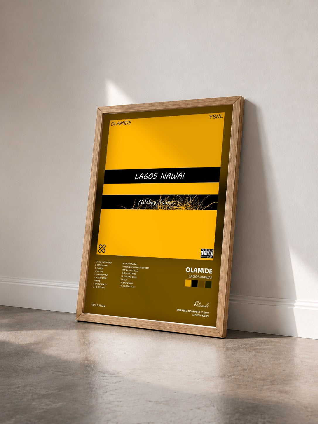 #bois Tableau de l'album Lagos Nawa! de Olamide vu de trois quarts, cadre en bois brut