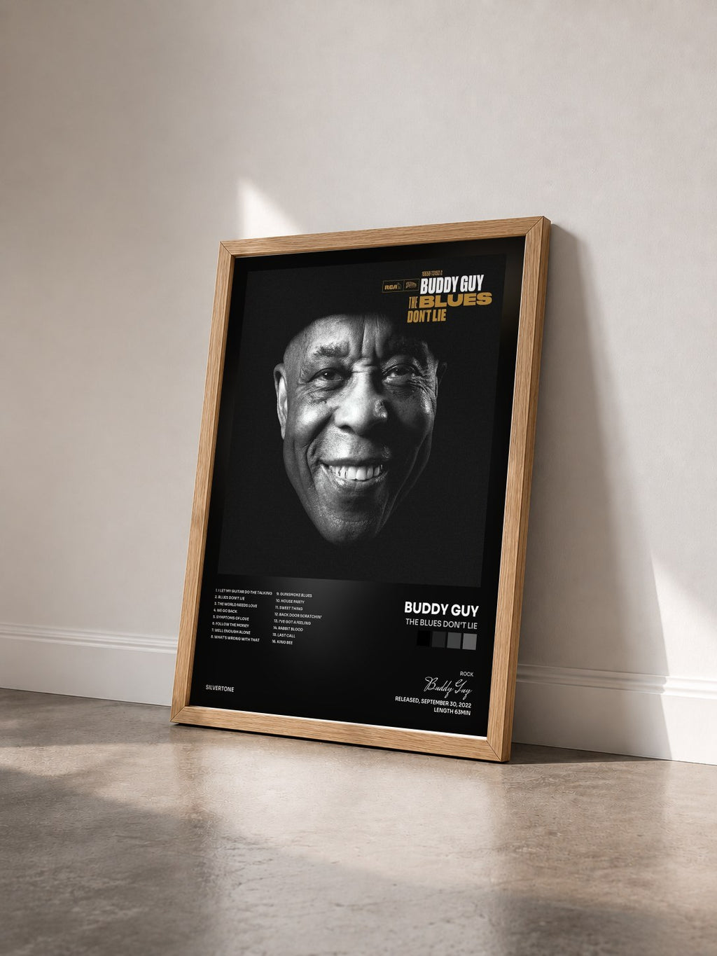 #bois Tableau de l'album The Blues Don't Lie de Buddy Guy vu de trois quarts, cadre en bois brut