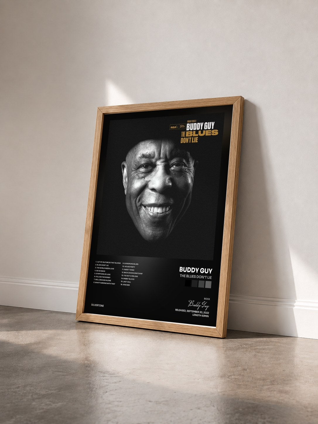 #bois Tableau de l'album The Blues Don't Lie de Buddy Guy vu de trois quarts, cadre en bois brut