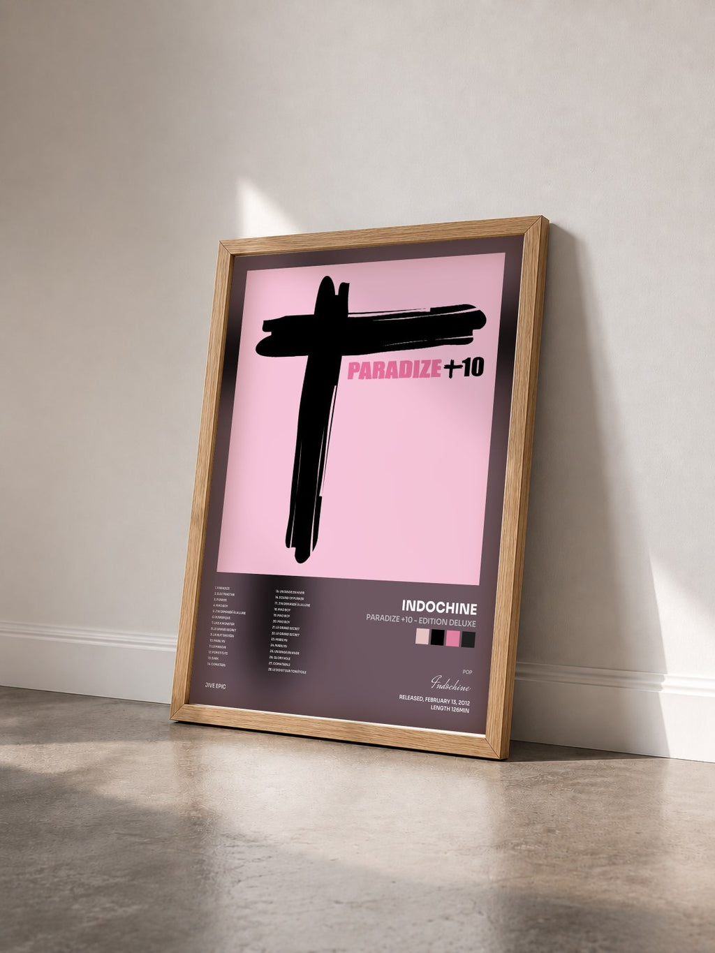 #bois Tableau de l'album Paradize +10 - Edition Deluxe de Indochine vu de trois quarts, cadre en bois brut