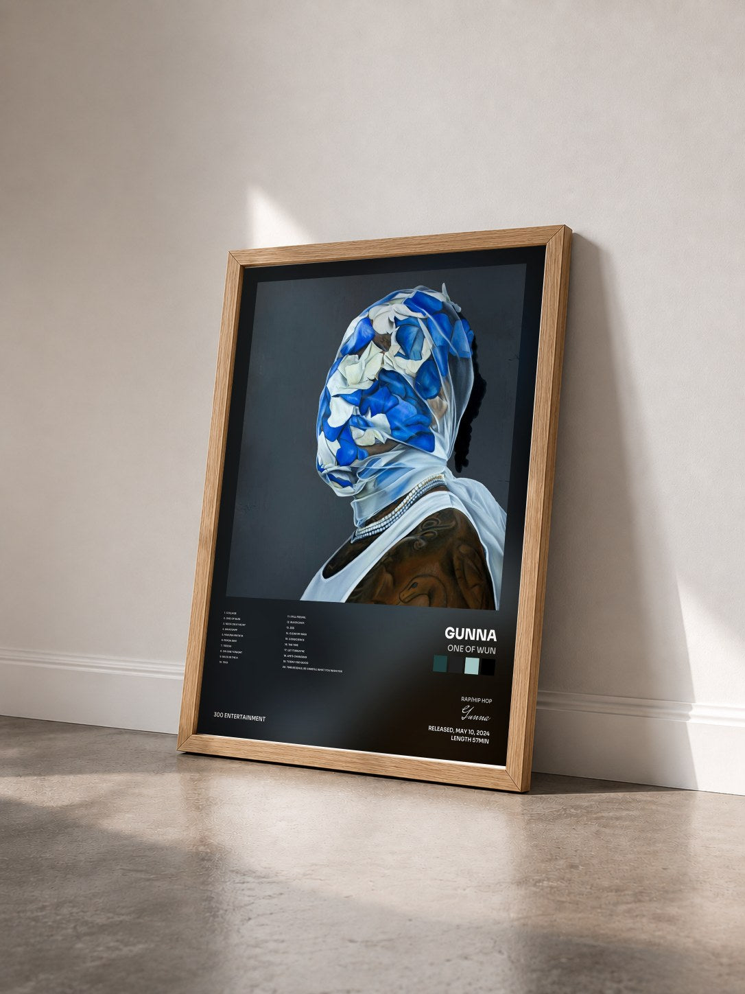 #bois Tableau de l'album One of Wun de Gunna vu de trois quarts, cadre en bois brut