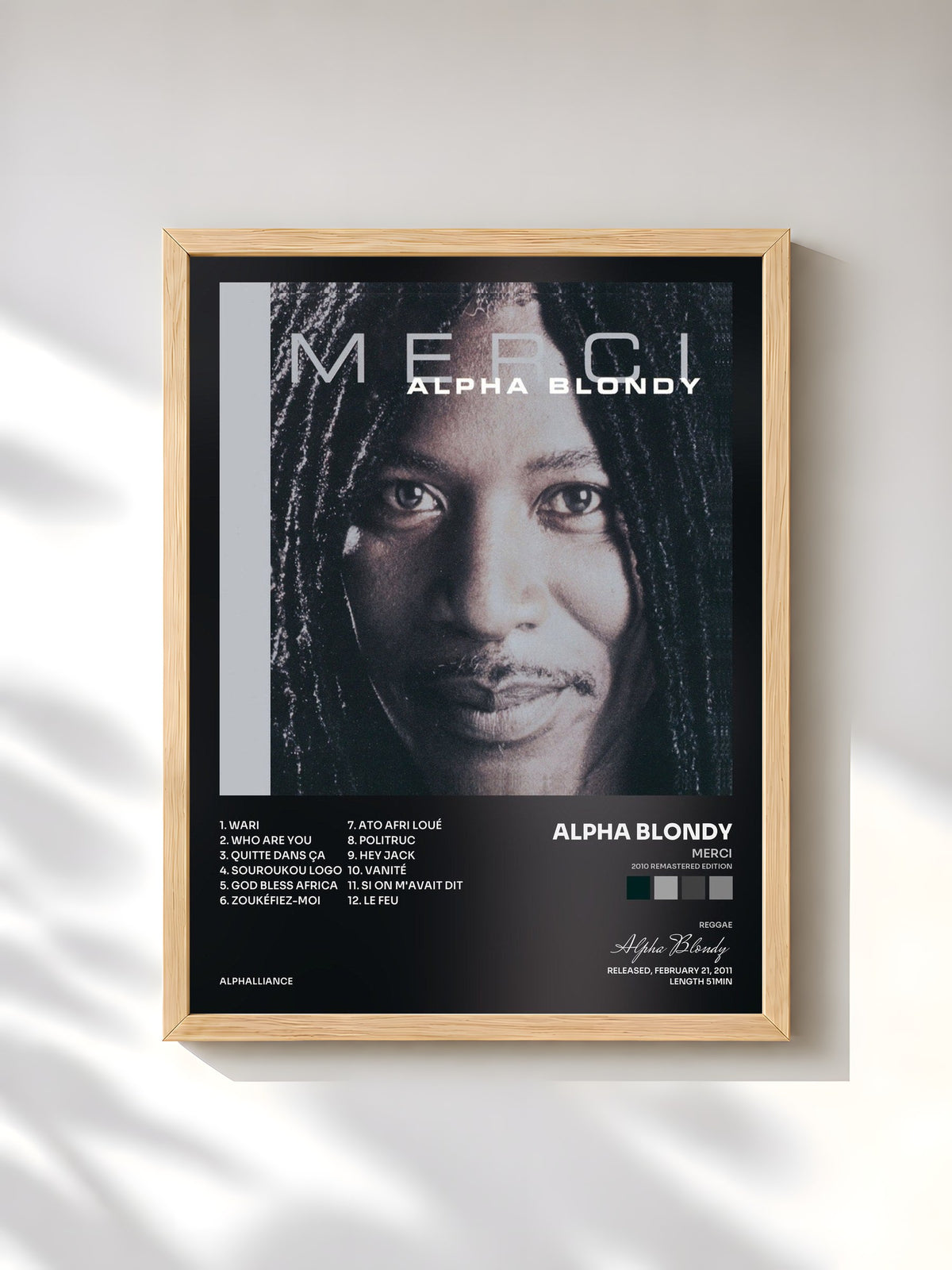 #bois Tableau de l'album Merci (2010 Remastered Edition) de Alpha Blondy, cadre en bois brut, imprimé et encadré en France