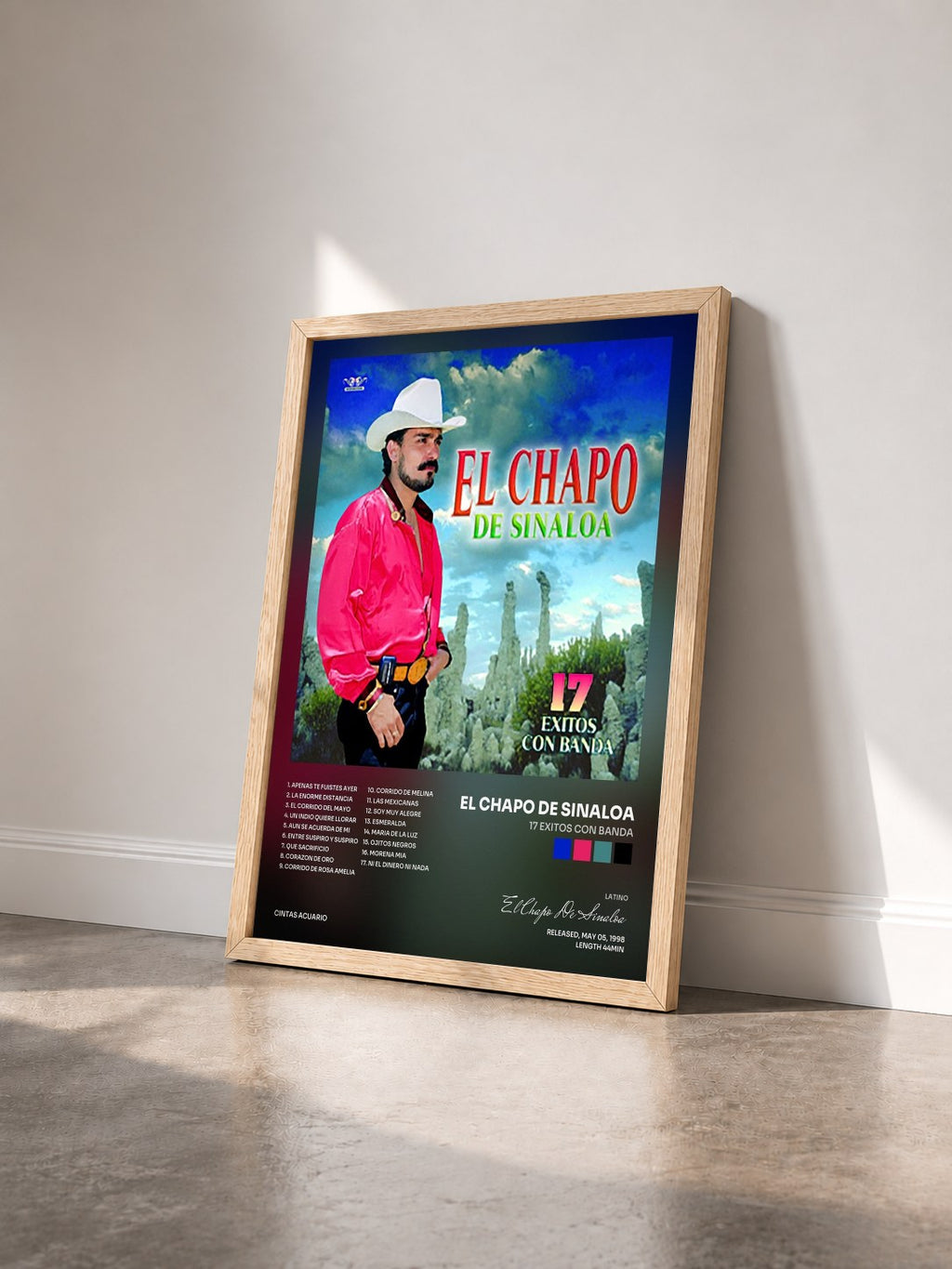 #bois Tableau de l'album 17 Exitos Con Banda de El Chapo De Sinaloa vu de trois quarts, cadre en bois brut