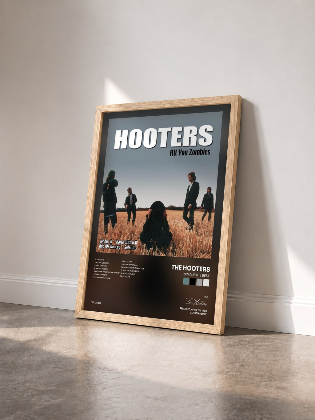 #bois Tableau de l'album Simply The Best de The Hooters vu de trois quarts, cadre en bois brut