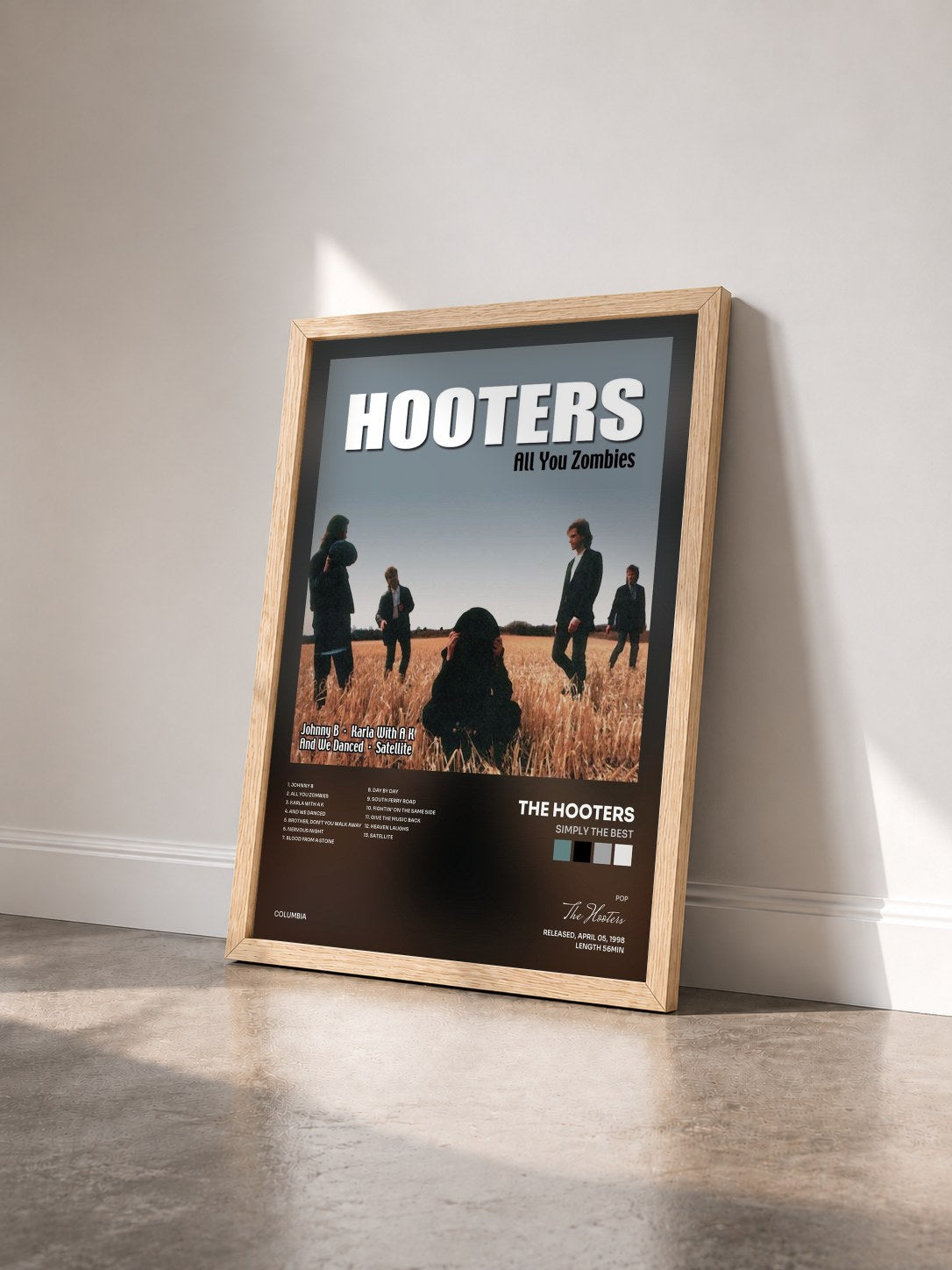 #bois Tableau de l'album Simply The Best de The Hooters vu de trois quarts, cadre en bois brut