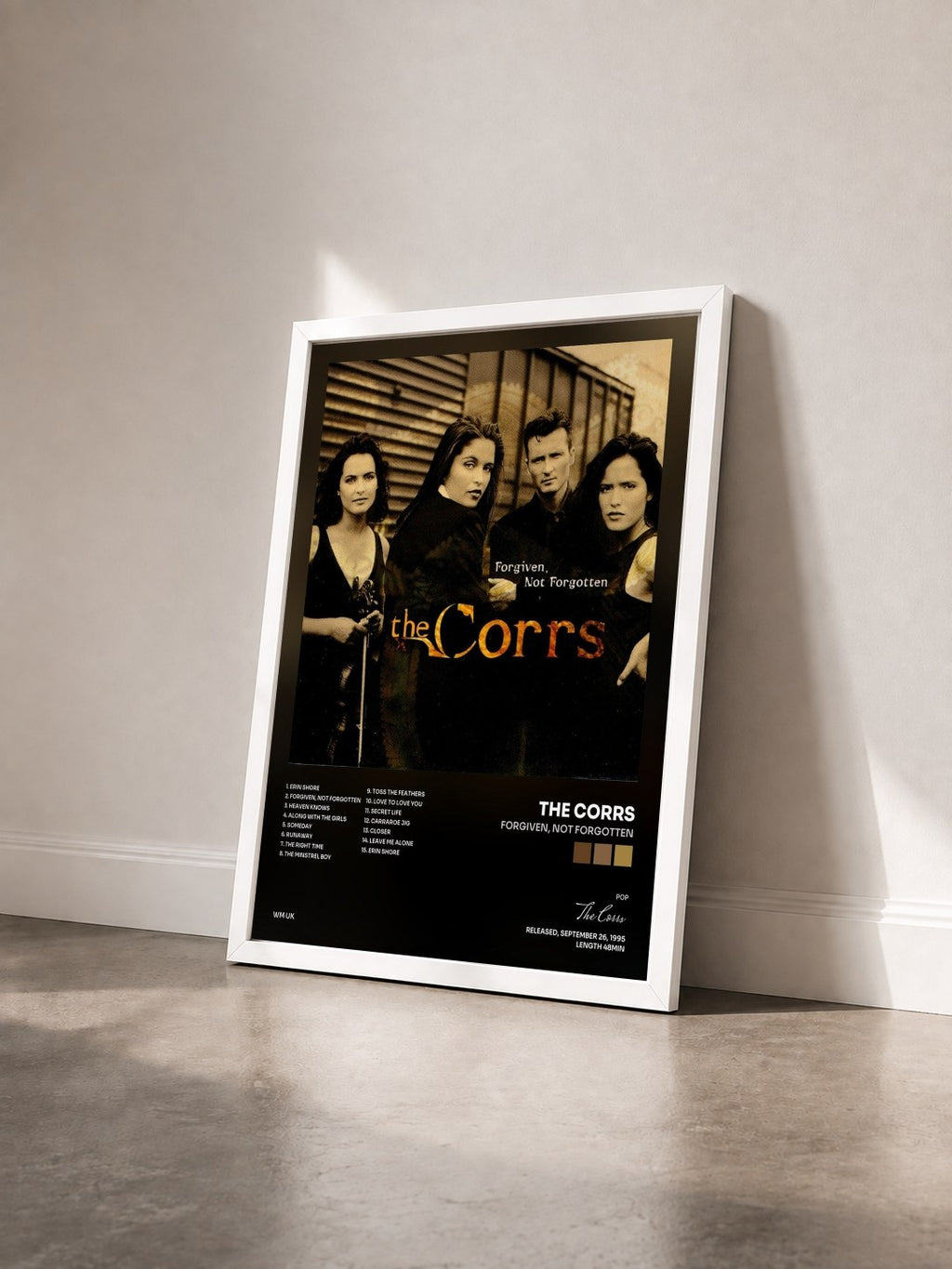 #blanc Tableau de l'album Forgiven, Not Forgotten de The Corrs vu de trois quarts, cadre blanc