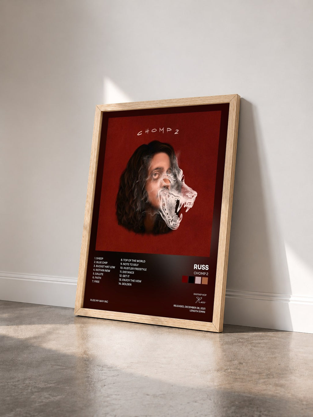 #bois Tableau de l'album CHOMP 2 de Russ vu de trois quarts, cadre en bois brut