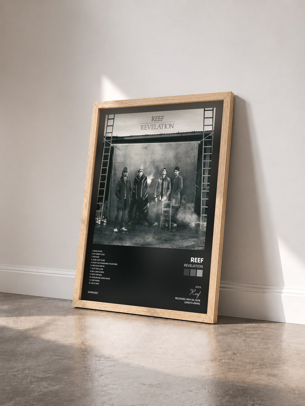 #bois Tableau de l'album Revelation de Reef vu de trois quarts, cadre en bois brut