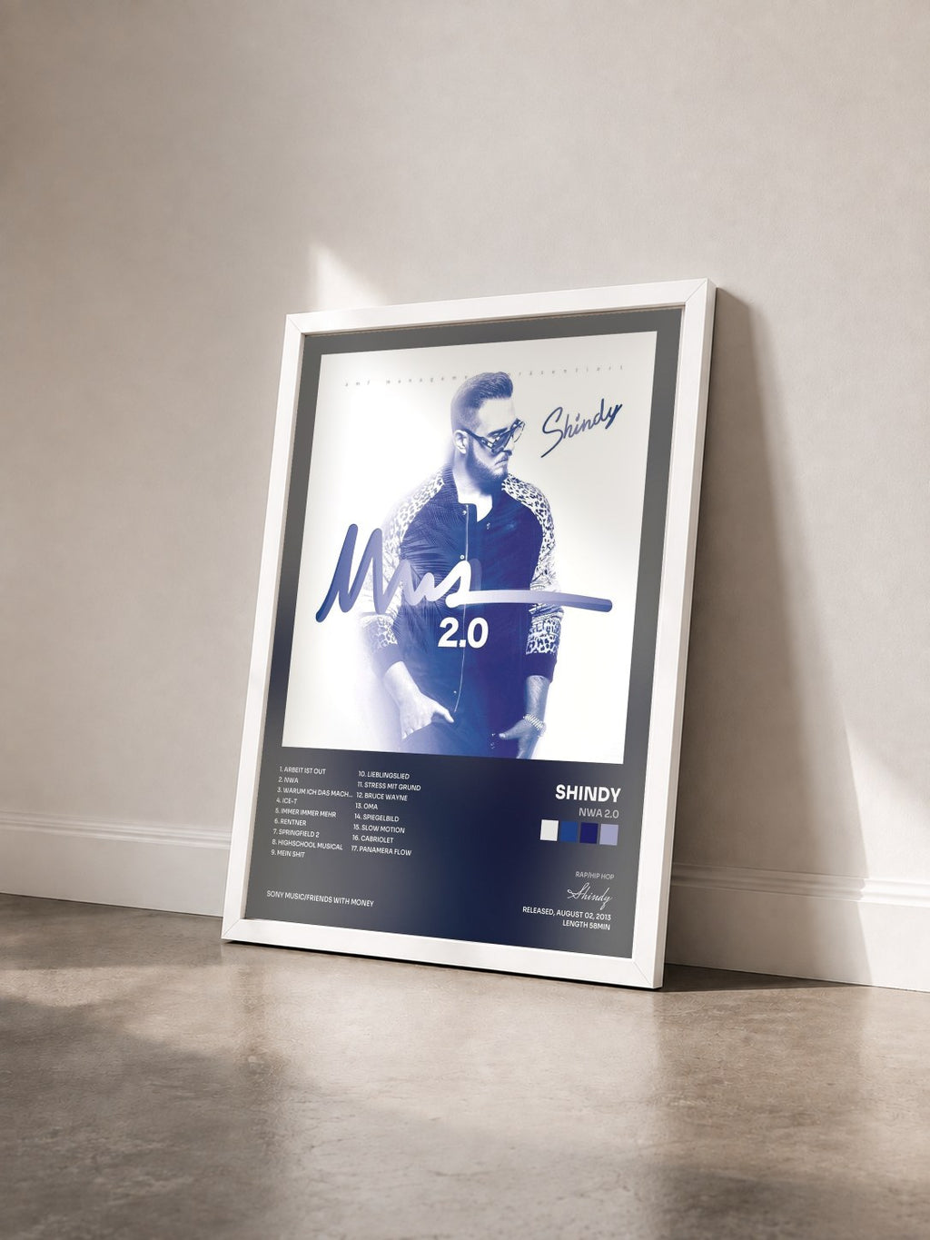 #blanc Tableau de l'album NWA 2.0 de Shindy vu de trois quarts, cadre blanc