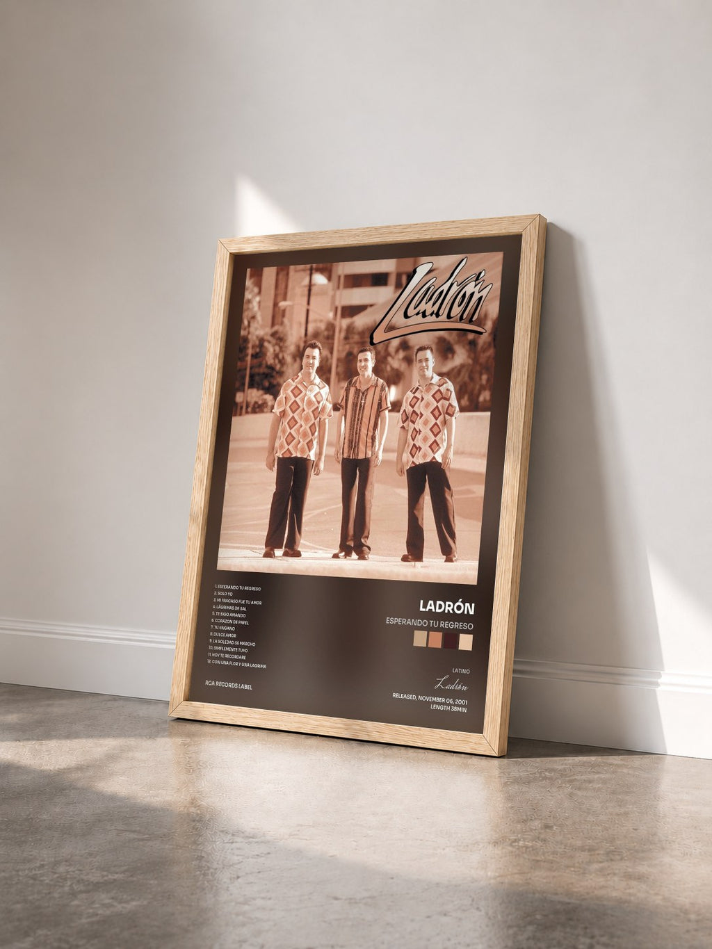 #bois Tableau de l'album Esperando Tu Regreso de Ladrón vu de trois quarts, cadre en bois brut