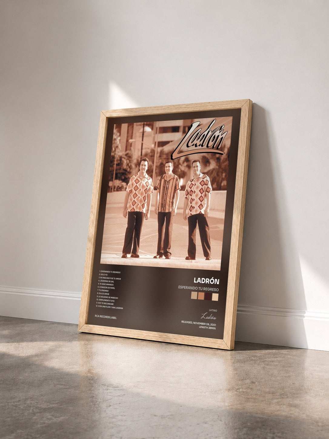 #bois Tableau de l'album Esperando Tu Regreso de Ladrón vu de trois quarts, cadre en bois brut
