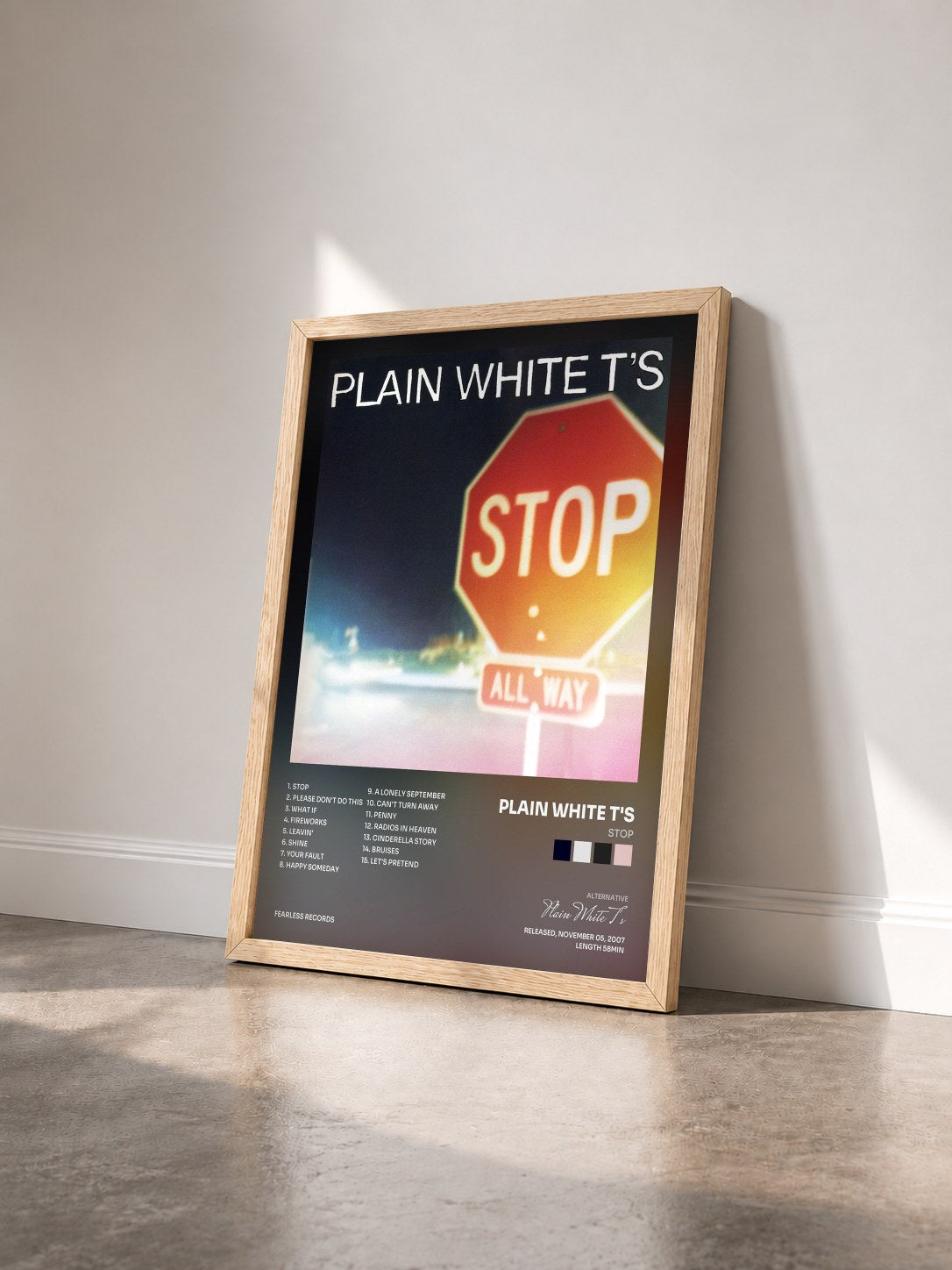 #bois Tableau de l'album Stop de Plain White T's vu de trois quarts, cadre en bois brut