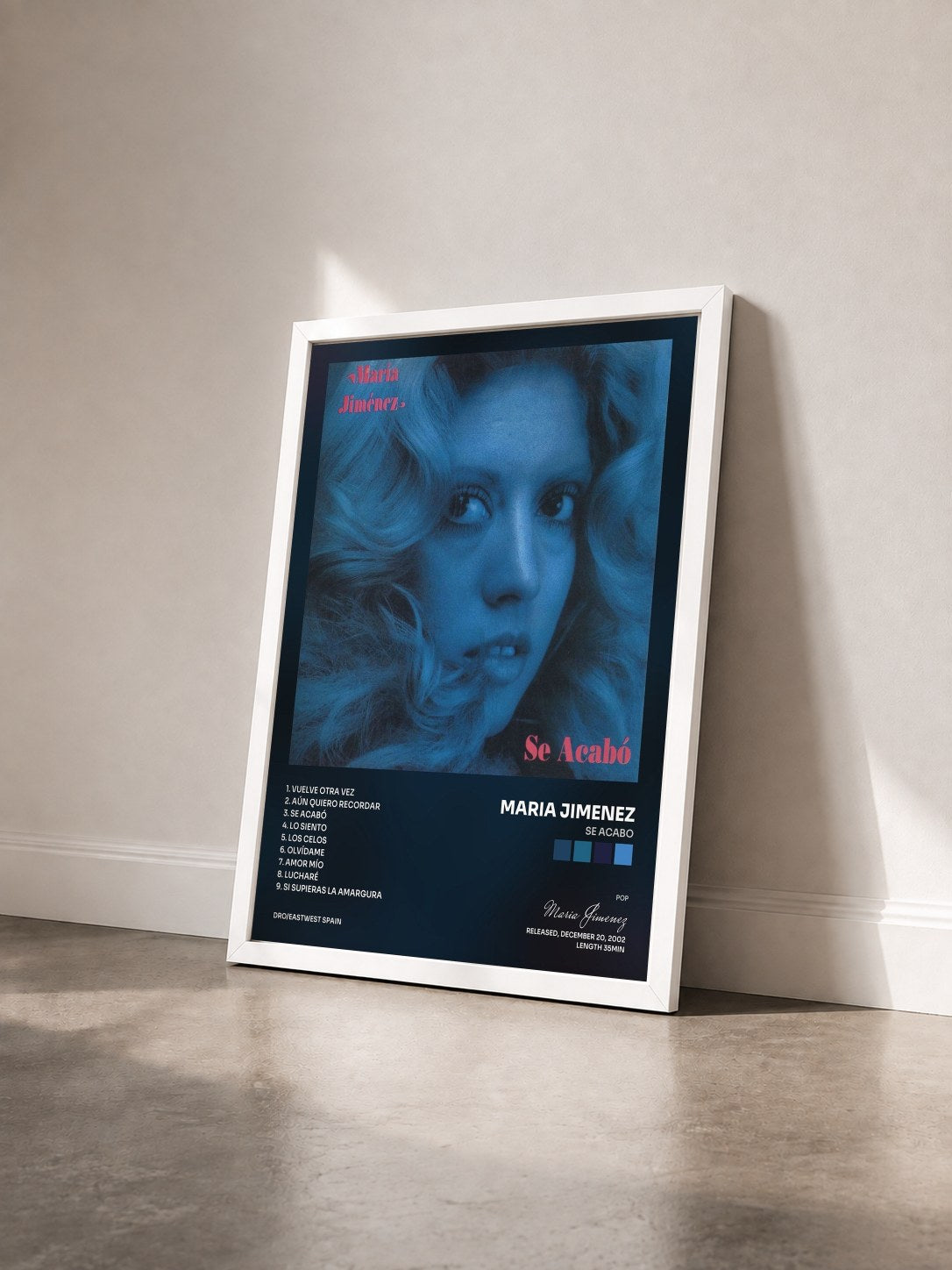 #blanc Tableau de l'album Se acabo de Maria Jimenez vu de trois quarts, cadre blanc
