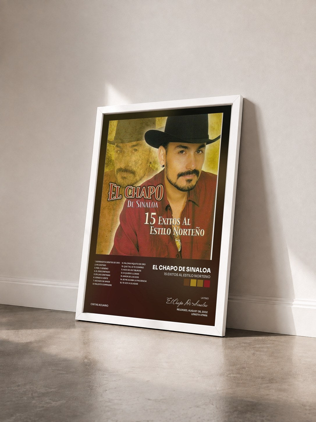 #blanc Tableau de l'album 15 Exitos al Estilo Norteno de El Chapo De Sinaloa vu de trois quarts, cadre blanc
