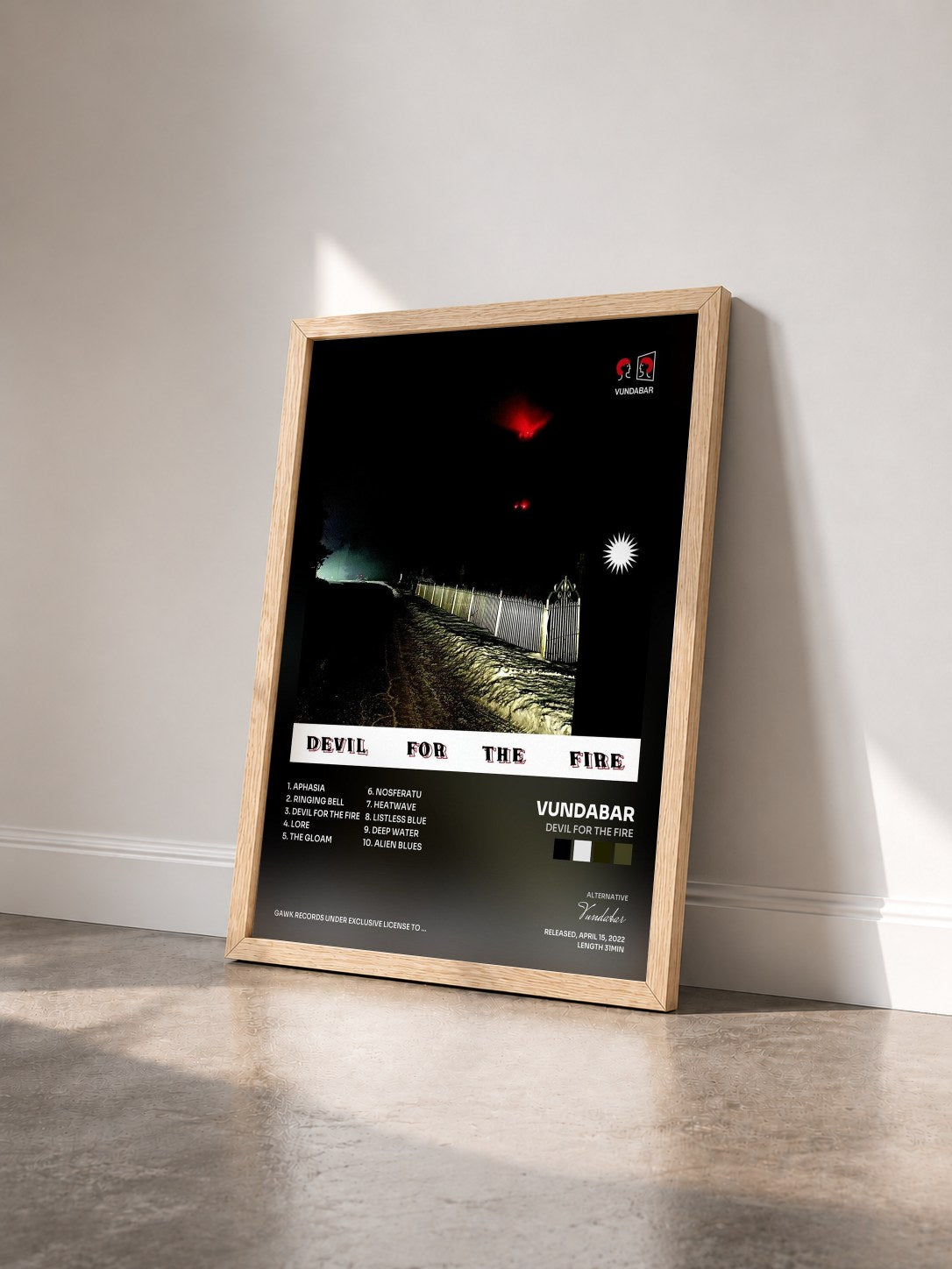 #bois Tableau de l'album Devil for the Fire de Vundabar vu de trois quarts, cadre en bois brut
