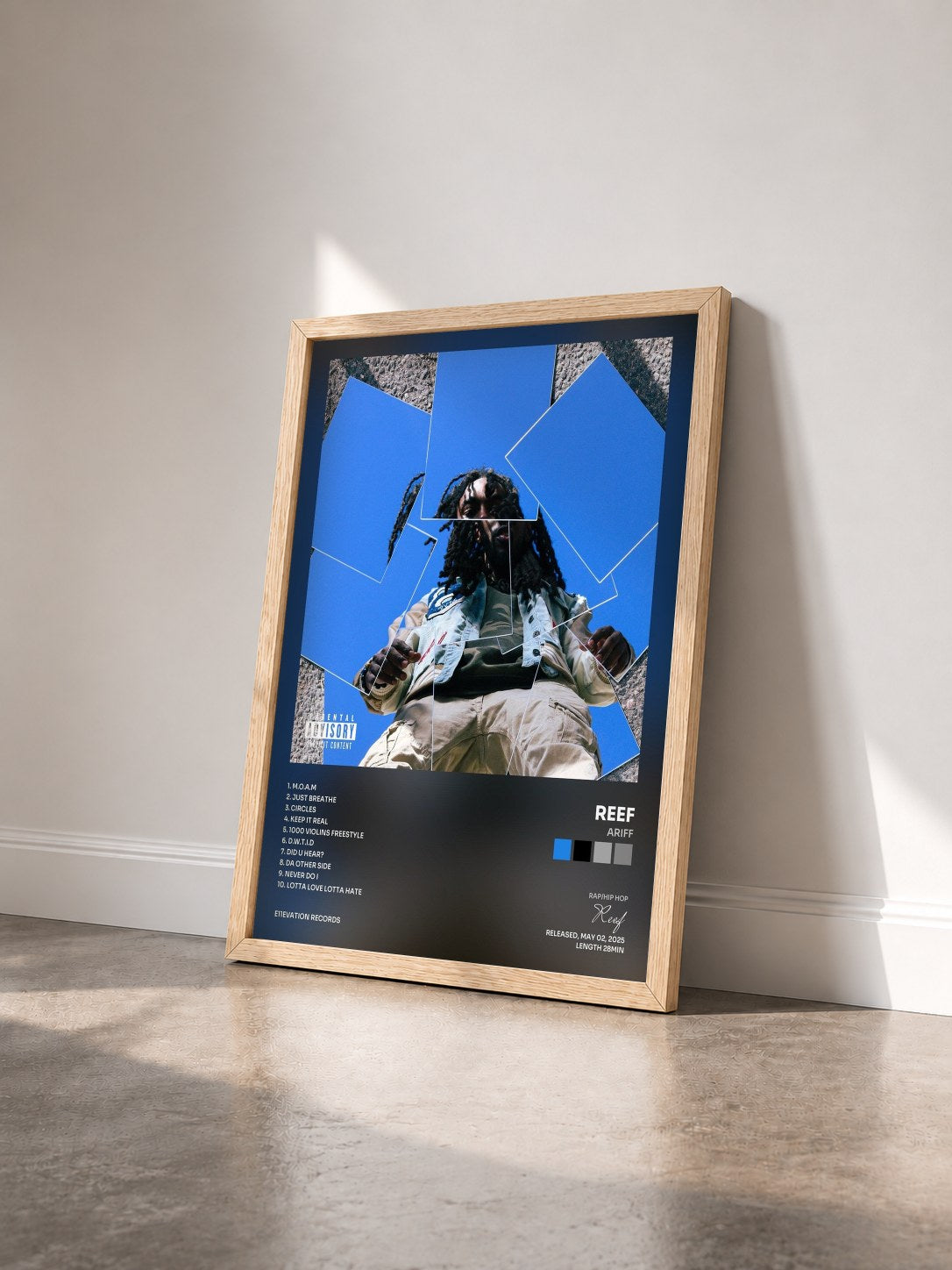 #bois Tableau de l'album ARIFF de Reef vu de trois quarts, cadre en bois brut
