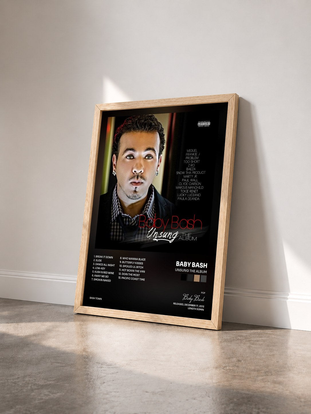 #bois Tableau de l'album Unsung The Album de Baby Bash vu de trois quarts, cadre en bois brut