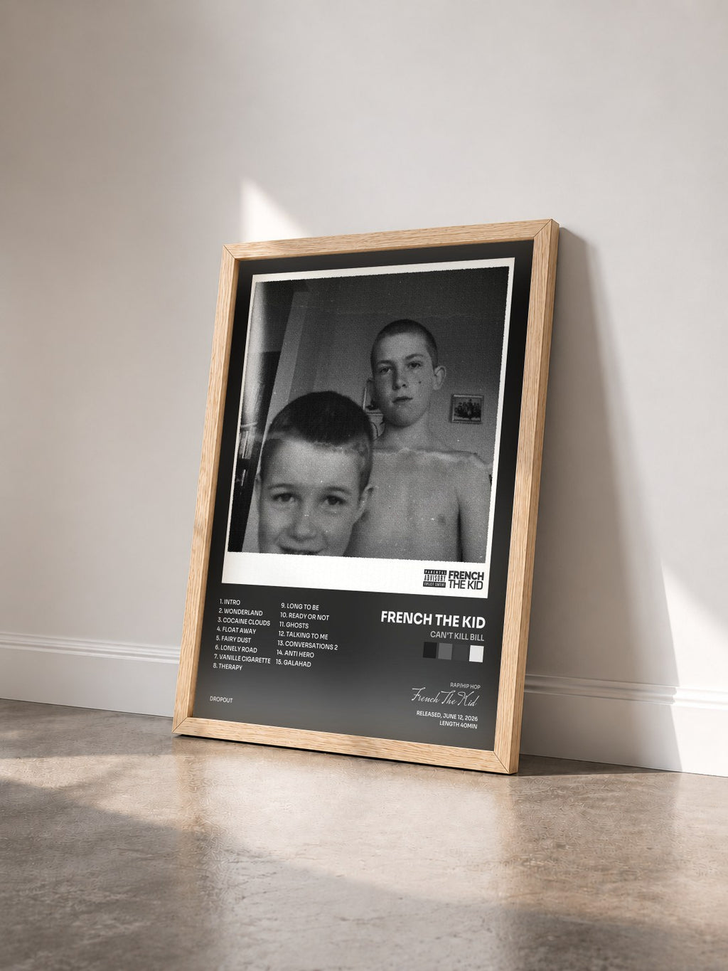 #bois Tableau de l'album Can't Kill Bill de French The Kid vu de trois quarts, cadre en bois brut