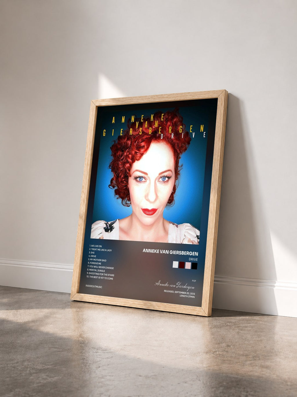#bois Tableau de l'album Drive de Anneke van Giersbergen vu de trois quarts, cadre en bois brut