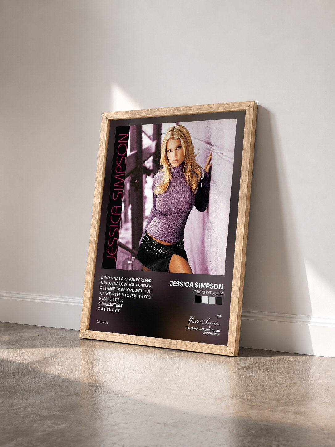 #bois Tableau de l'album This Is The Remix de Jessica Simpson vu de trois quarts, cadre en bois brut