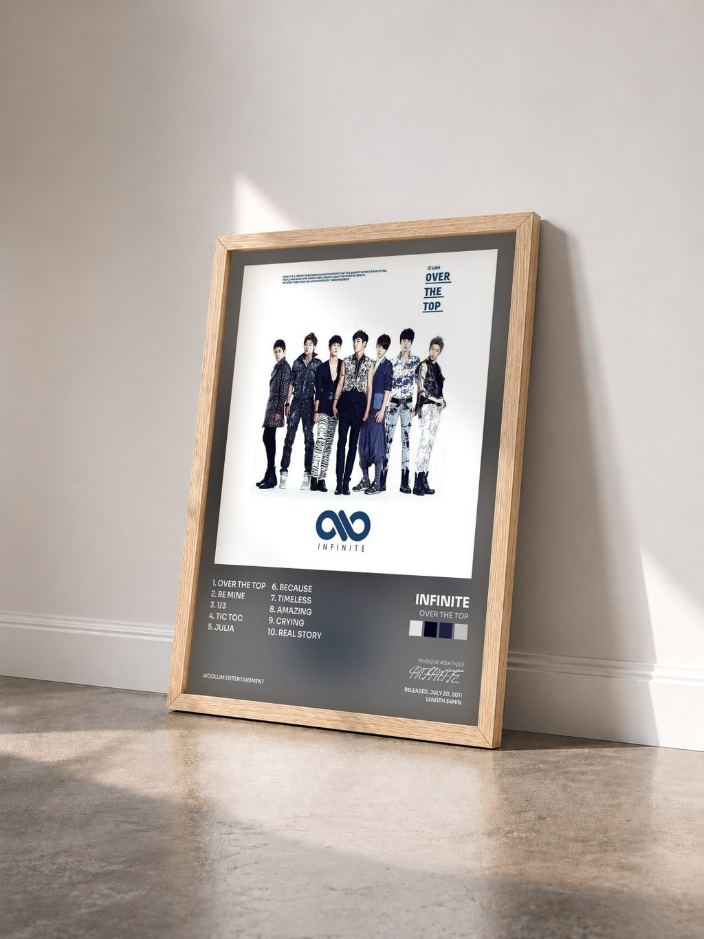 #bois Tableau de l'album Over The TOP de INFINITE vu de trois quarts, cadre en bois brut