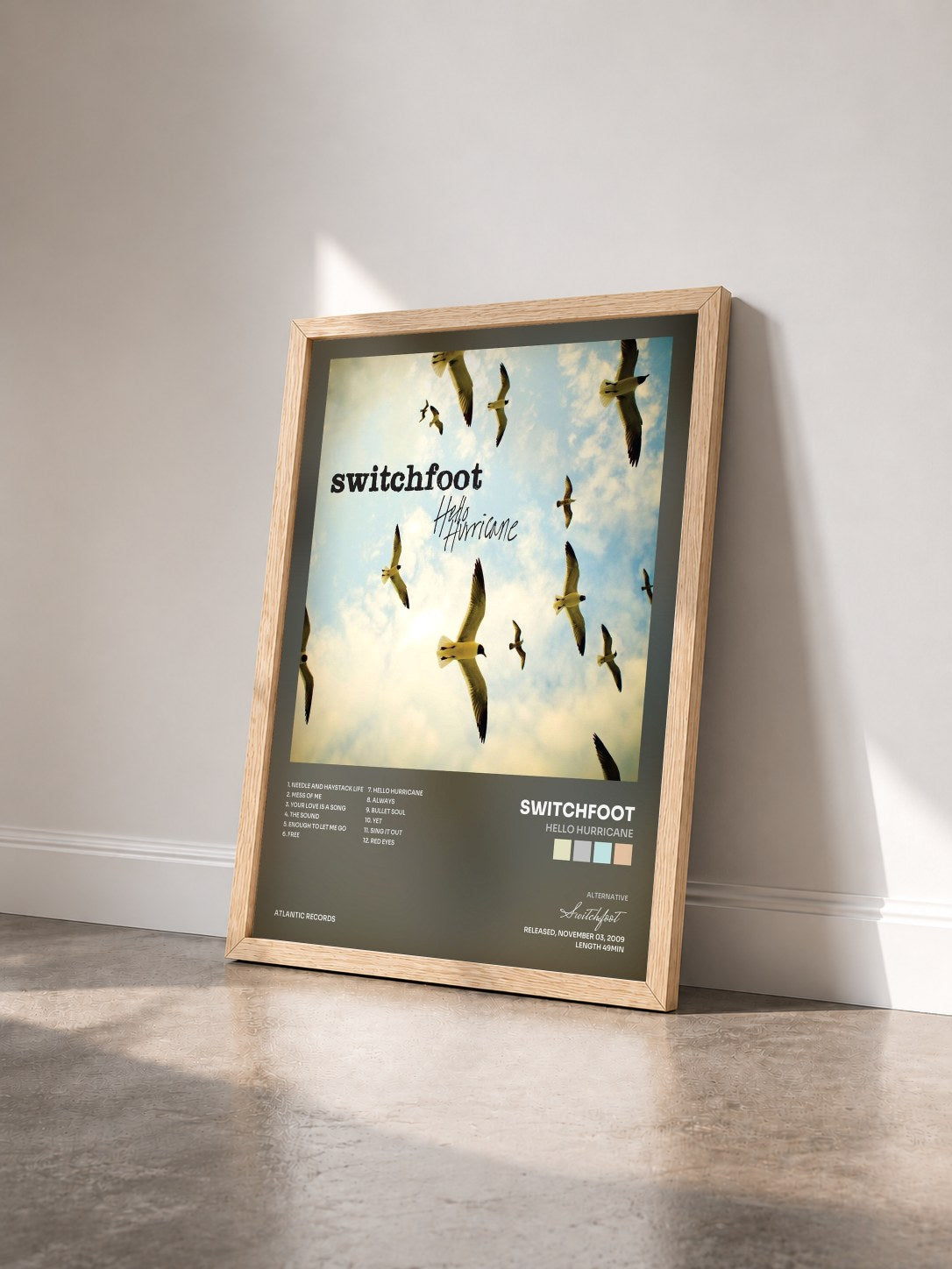 #bois Tableau de l'album Hello Hurricane de Switchfoot vu de trois quarts, cadre en bois brut