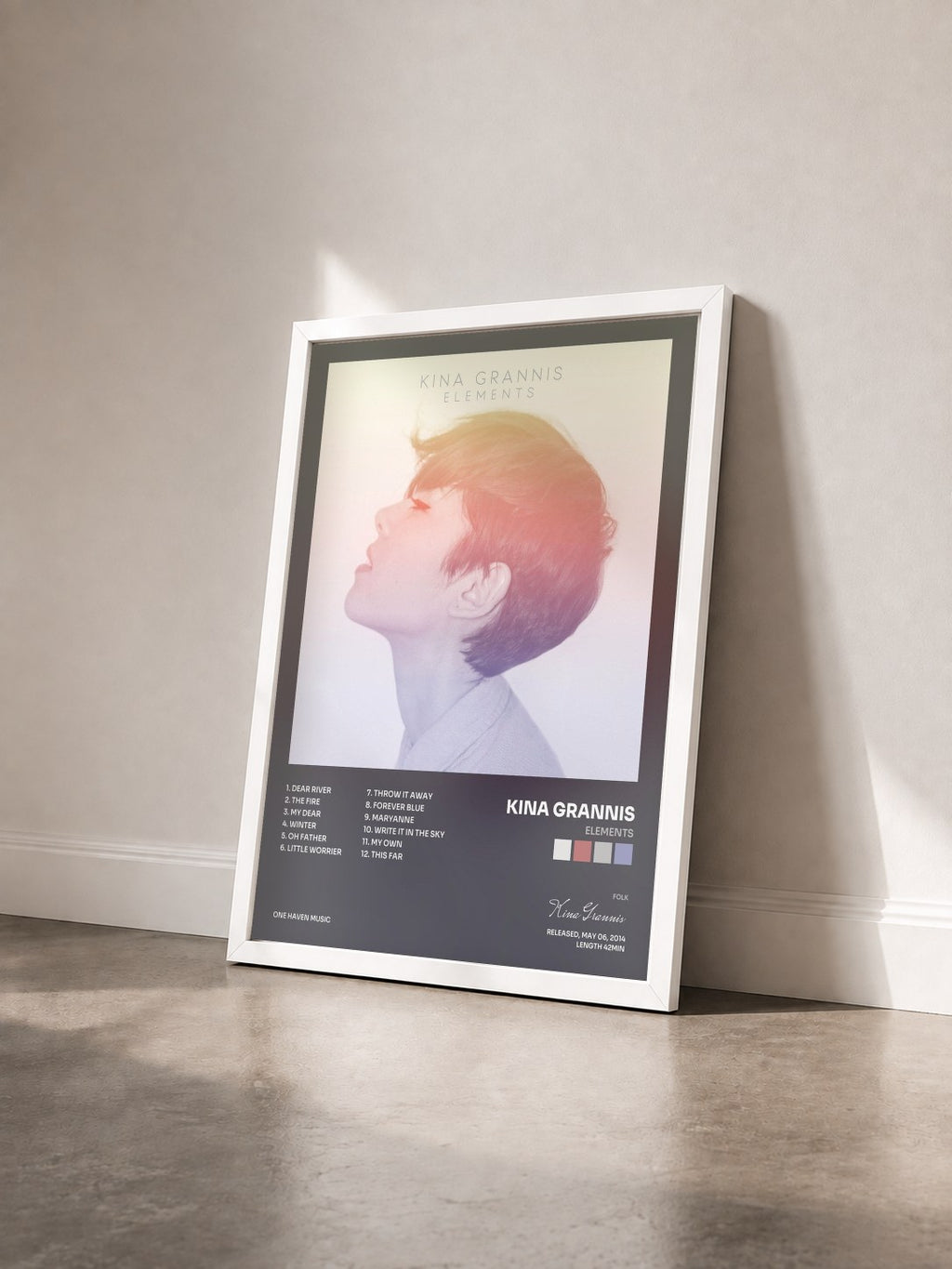 #blanc Tableau de l'album Elements de Kina Grannis vu de trois quarts, cadre blanc