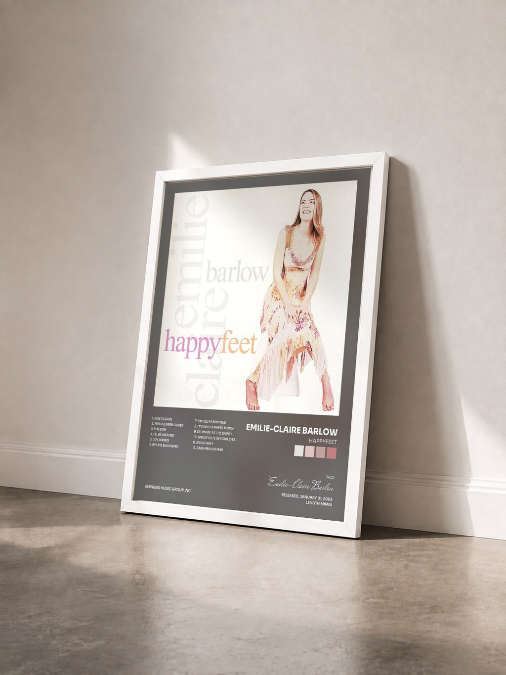 #blanc Tableau de l'album Happyfeet de Emilie-Claire Barlow vu de trois quarts, cadre blanc