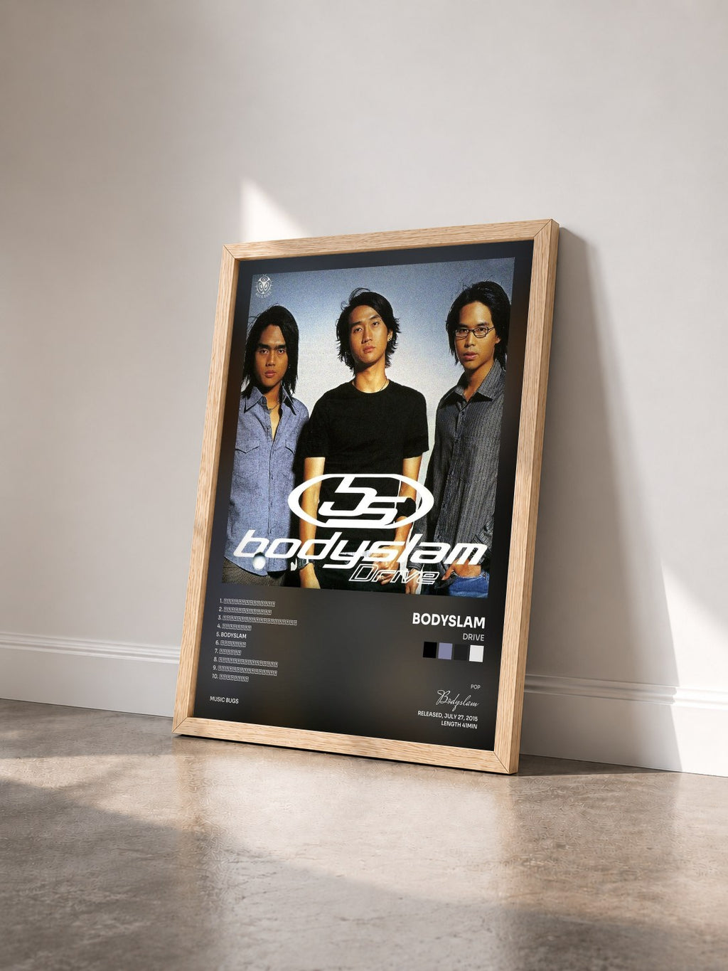 #bois Tableau de l'album Drive de Bodyslam vu de trois quarts, cadre en bois brut