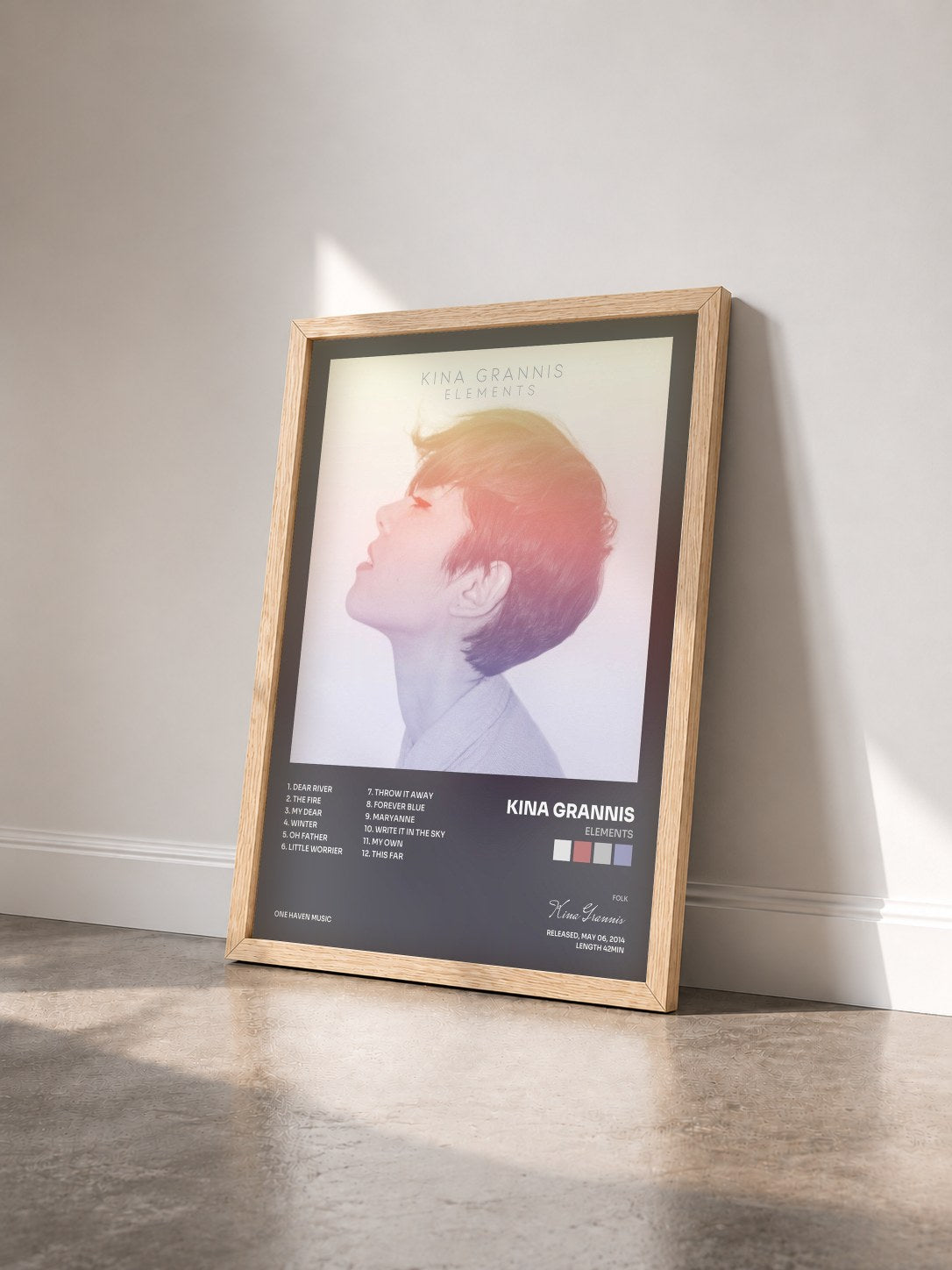 #bois Tableau de l'album Elements de Kina Grannis vu de trois quarts, cadre en bois brut
