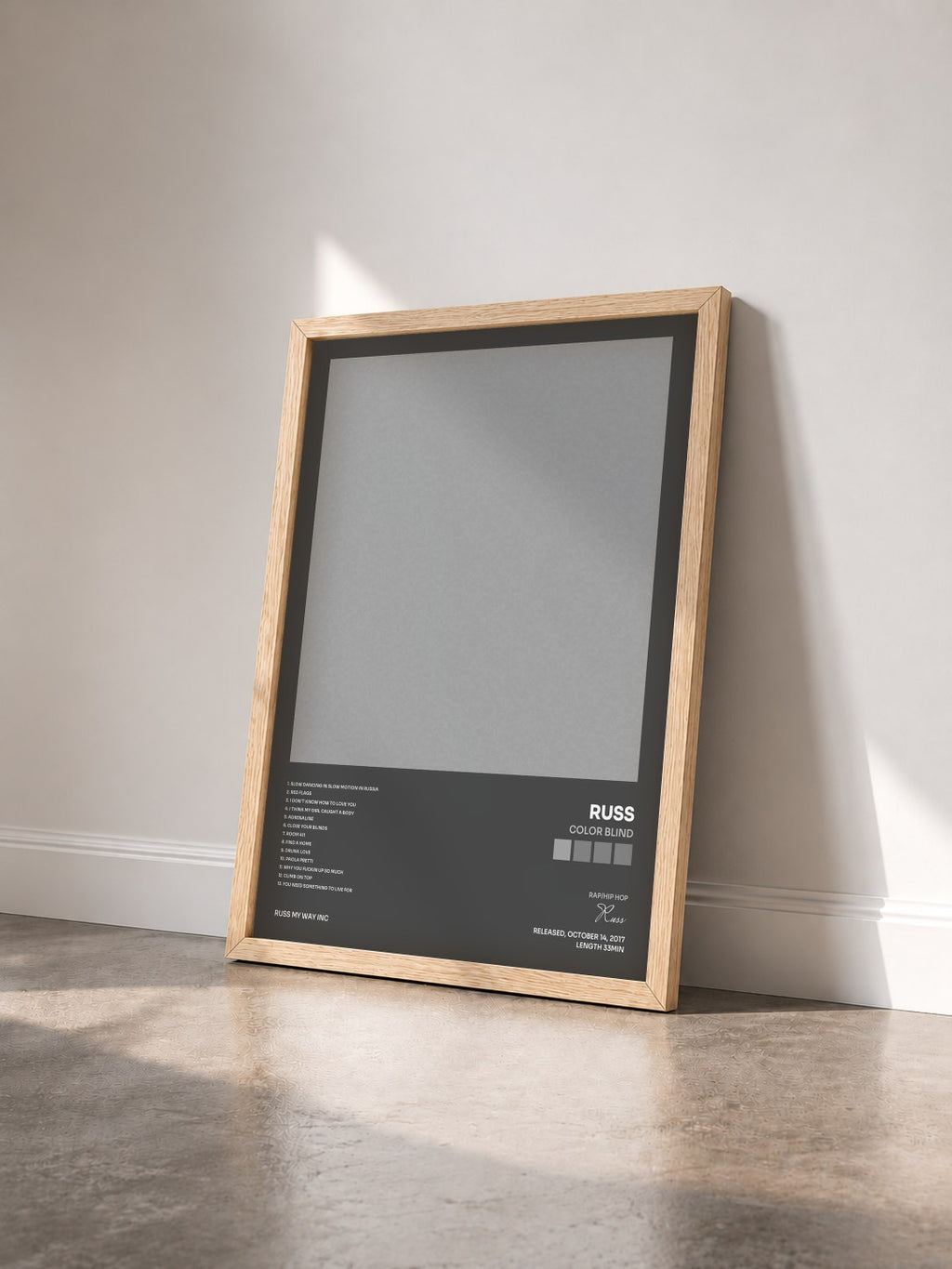 #bois Tableau de l'album Color Blind de Russ vu de trois quarts, cadre en bois brut