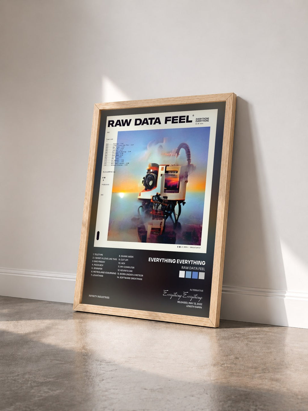 #bois Tableau de l'album Raw Data Feel de Everything Everything vu de trois quarts, cadre en bois brut