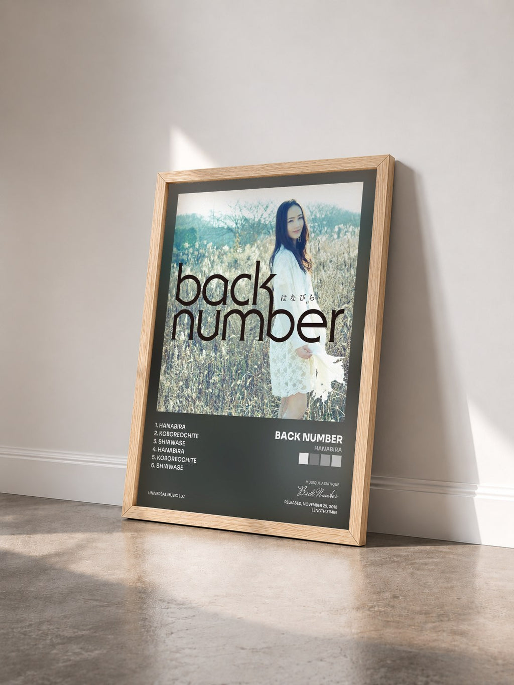 #bois Tableau de l'album Hanabira de Back Number vu de trois quarts, cadre en bois brut