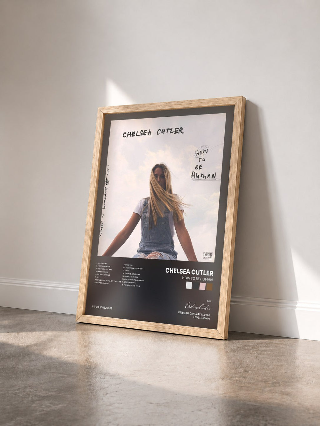 #bois Tableau de l'album How To Be Human de Chelsea Cutler vu de trois quarts, cadre en bois brut