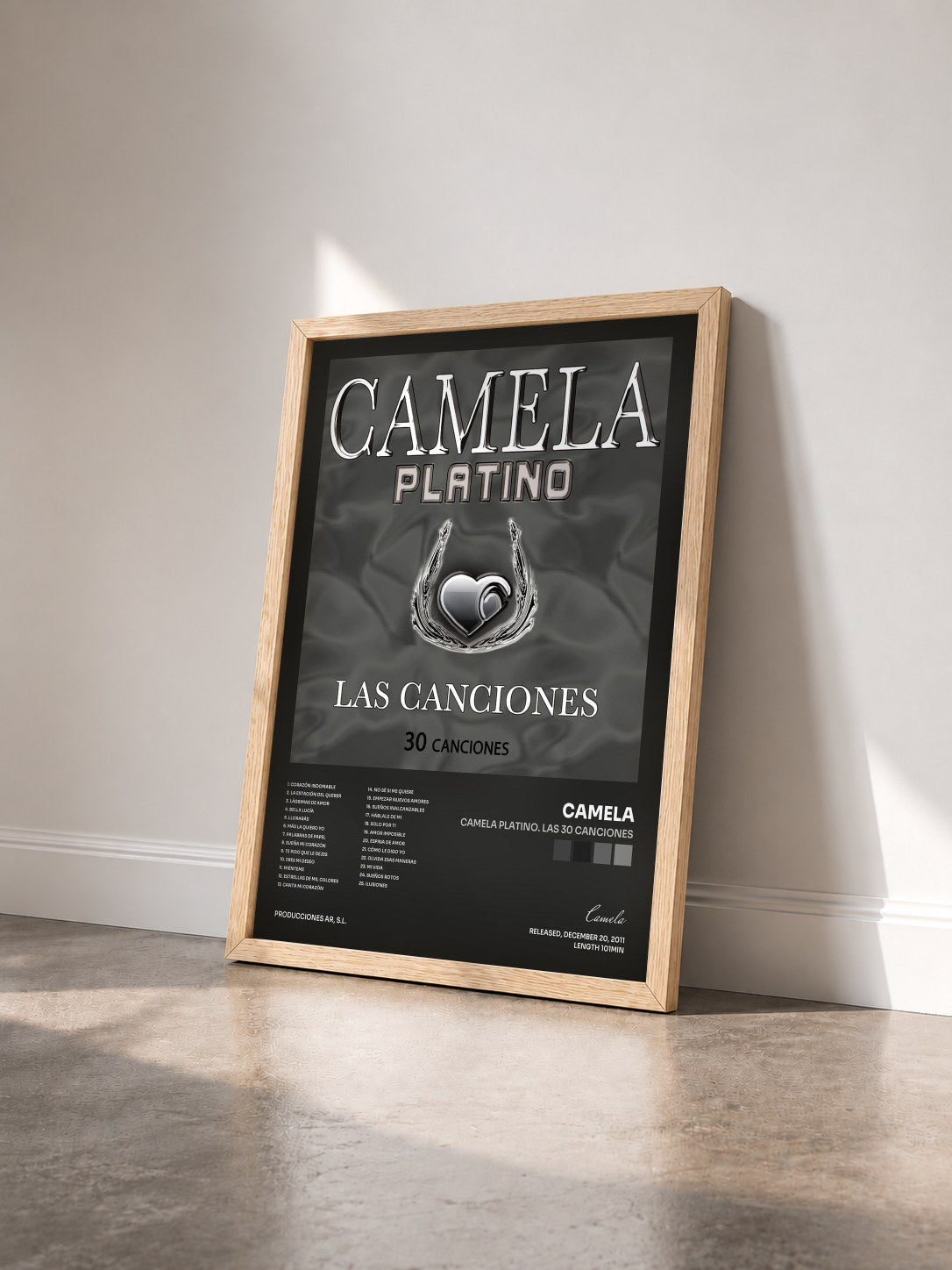 #bois Tableau de l'album Camela Platino. Las 30 Canciones de Camela vu de trois quarts, cadre en bois brut