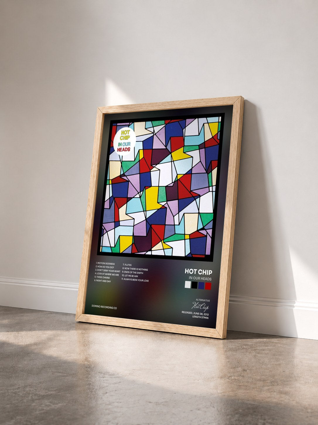 #bois Tableau de l'album In Our Heads de Hot Chip vu de trois quarts, cadre en bois brut